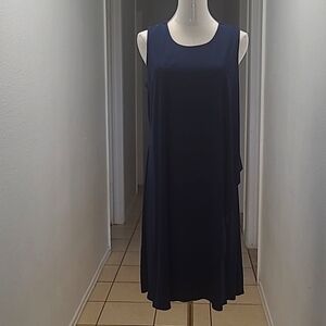 Navy blue dressy dress with overlay front and mid length, cute tie in back